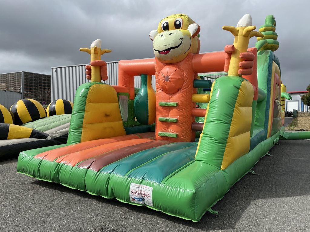 Parcours gonflable singe occasion avec jeux et toboggan
